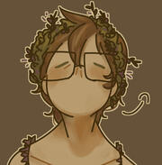 Profile picture, contains stylized cartoon-like self portrait of the artist; character has medium short hair with long bangs, a pair of square glasses and a flowercrown